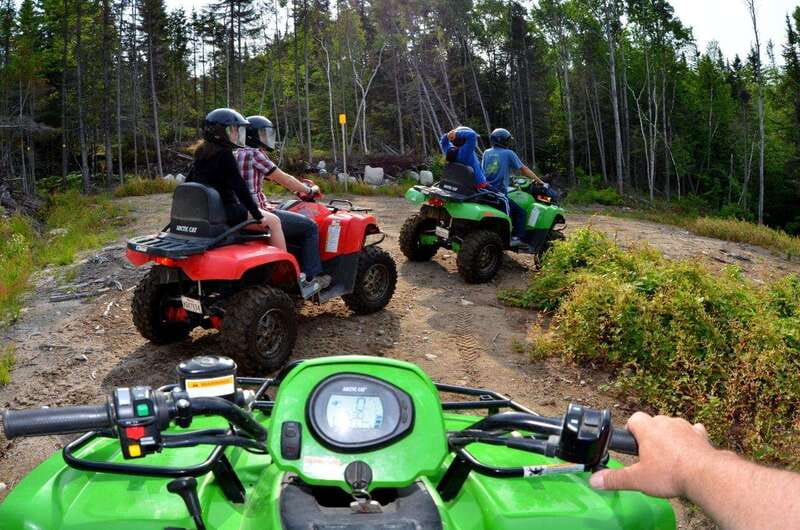 15 min. Tadoussac : Guided ATV tour excursion - Into the woods: hills, turns, and technical ground