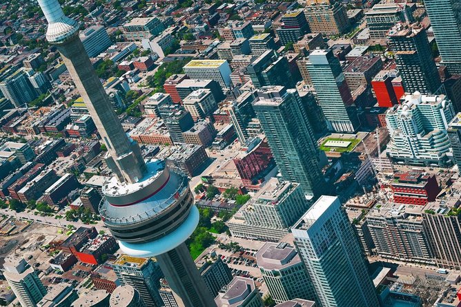 20 km Helicopter Tour over Toronto - Market rooftops, the Distillery District, and city details
