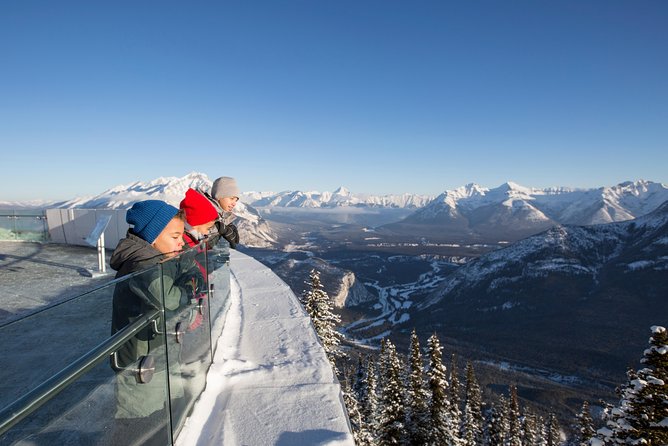Banff Winter Tour Featuring Mountaintop Dinner and Banff Gondola - Surprise Corner and Bow Falls complete the town-side route