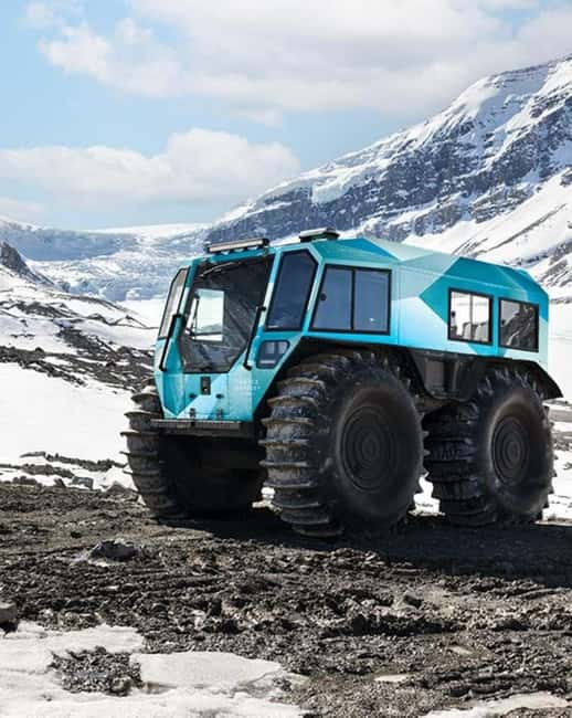 Calgary: Icefield Adventure, Skywalk and three Glaciers Tour - Herbert Lake starts the day quietly