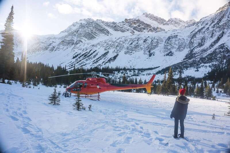Canadian Rockies: Abraham Lake Ice Bubbles Helicopter Tour - Landing at Landslide Lake for snowshoeing