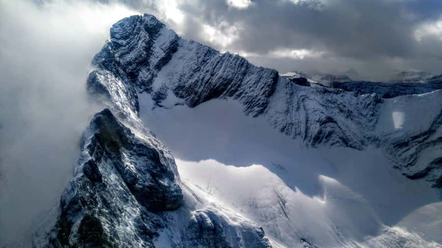 Canmore: 25-Minute Three Sisters Helicopter Tour - Taking off from Canmore toward the Three Sisters