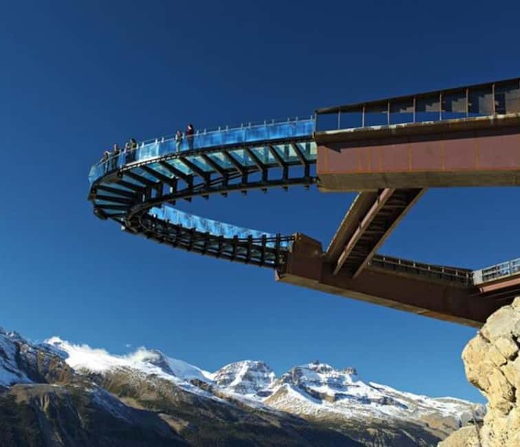 Columbia Icefield, Skywalk, Crowfoot Glacier, and Lakes Tour - Lake Louise begins the mountain parade