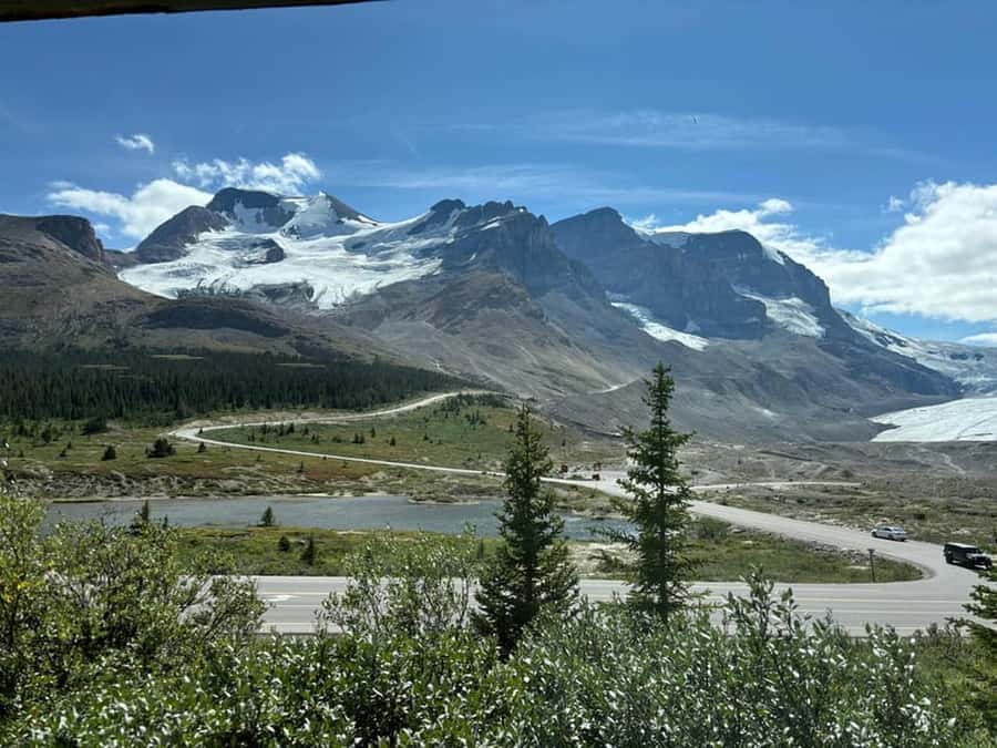 Columbia icefield, Skywalk, Waterfowl, Bow & Peyto Lake Tour - Crowfoot Glacier brings the ice into view