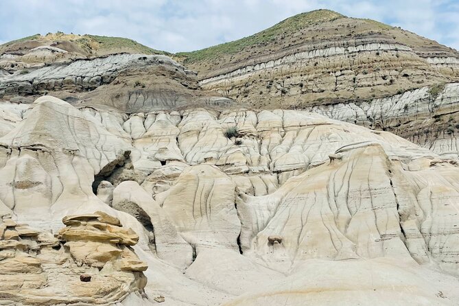 Day of Dinosaurs & Hoodoos from Calgary to Drumheller Badlands - The World’s Largest Dinosaur is a quick, playful stop