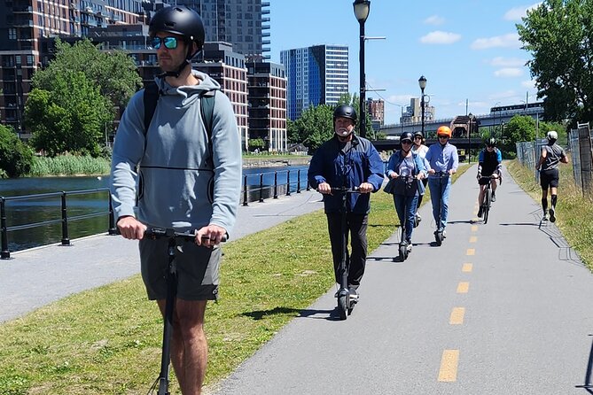 Experience Old Montreal on e-scooters with a local comedian - Starting in Old Montreal with Goofy Well-Done