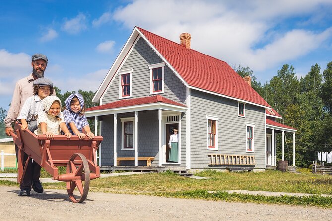 Family visit to the Acadian Historic Village - Historic buildings with people inside them