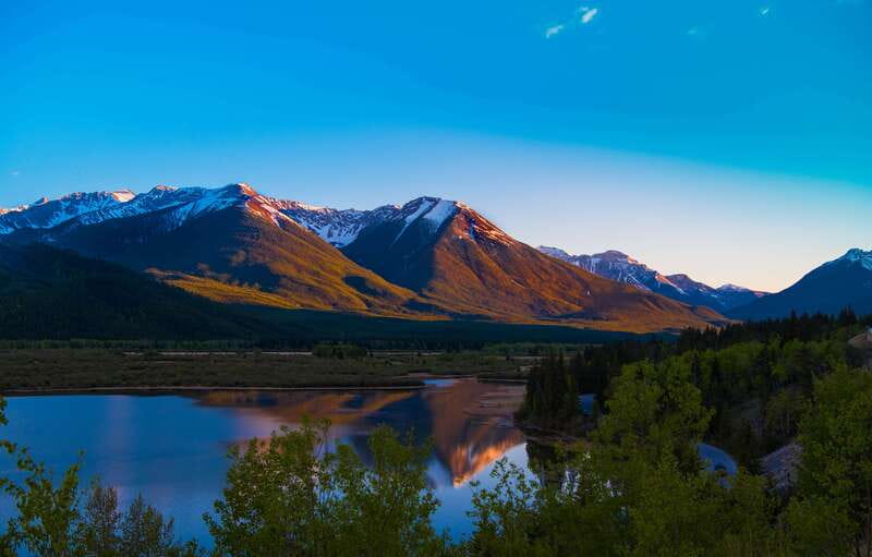 From Banff/Canmore: Deep 1 Day Tour in Banff National Park - Bow Falls shows the Bow River in motion