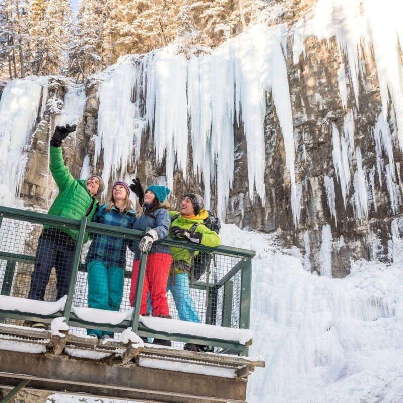 From Banff: Johnston Canyon Guided Icewalk - The Lower Falls tunnel and frozen waterfall