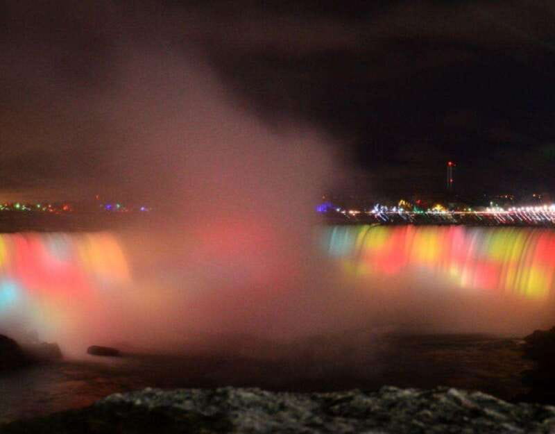 From Toronto: Niagara Falls Tour with Journey & Dinner - Clifton Hill supplies the bright winter energy