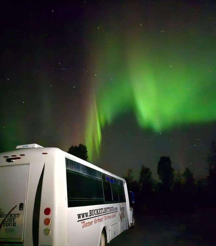 From Yellowknife: Aurora Borealis Tour with Cozy Cabin Base - Checking the sky from the cabin