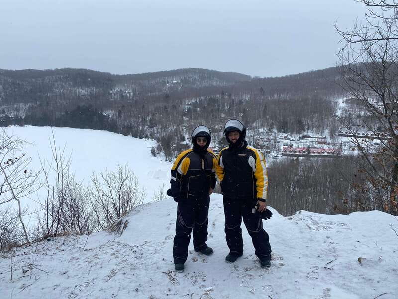 Montreal: Canadian Forest Guided Tour by Snowmobile - Wildlife, frozen water, and mountain views
