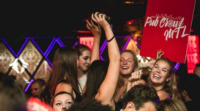 Montreal: Guided Bar Crawl with Free Shots and Club Entry - Starting at the first bar with a welcome shot