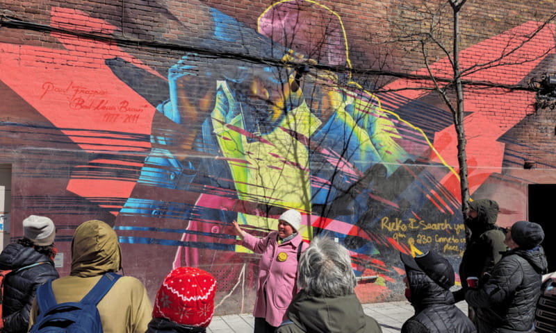 Montreal: Guided Walking Tour of Montreal's Murals - Walking into the Entertainment District