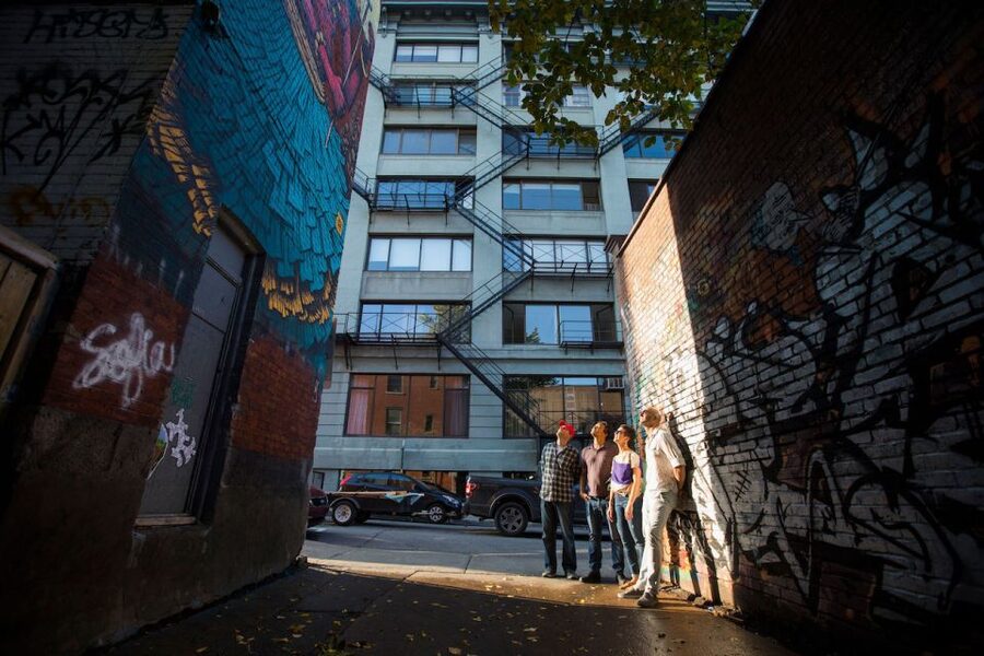 Montreal: Street Art & Mural 2-Hour Guided Walking Tour - Side streets, community projects, and local stops