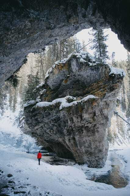 Moraine Lake Louise Emerald Johnston Canyon Banff Yoho Tour - Natural Bridge shows the force of the river