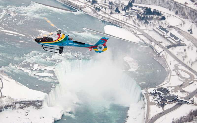 Niagara Falls: Private Half-Day Tour with Boat & Helicopter - Maple Leaf Place and the Floral Clock