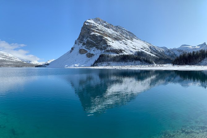 Private Tour of Lake Louise and the Icefield Parkway for up to 12 guests - Bow Falls begins the day in central Banff