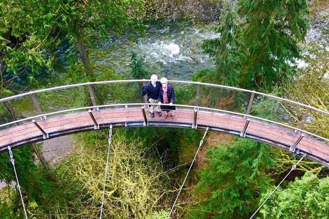 Private Tour: Vancouver Sightseeing and Capilano Suspension Bridge - Crossing Lion’s Gate Bridge into the forest
