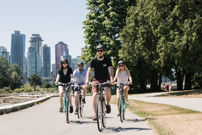 The Grand Bicycle Tour by Cycle City Tours - Stanley Park, seawall views, and giant cedar trees