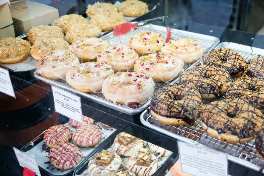 Toronto: Guided Donut Walking Tour with Tastings and Coffee - Queen Street brings shops, food, and city context